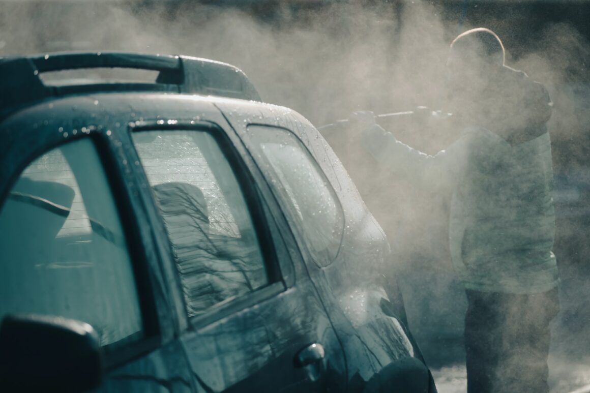 Dirty offroad car in a car wash