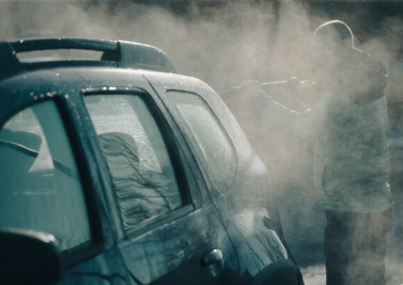 Dirty offroad car in a car wash