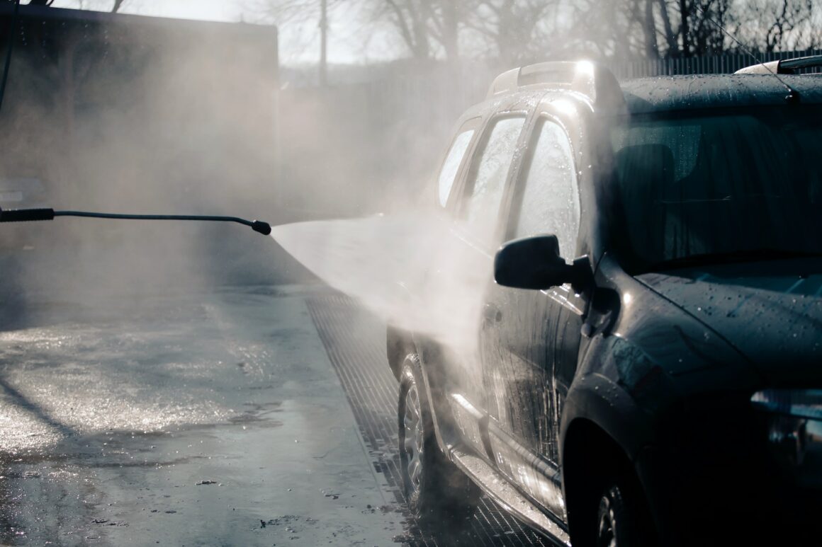 Dirty offroad car in a car wash