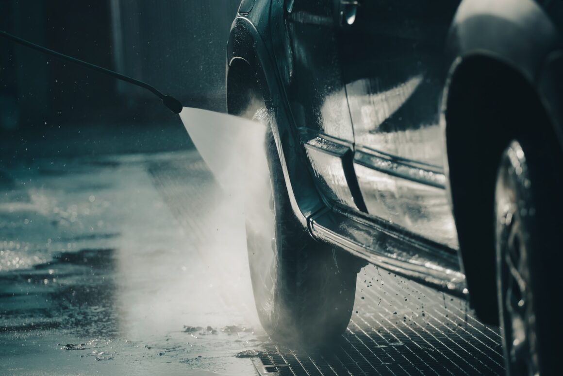 Dirty offroad car in a car wash