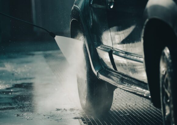 Dirty offroad car in a car wash