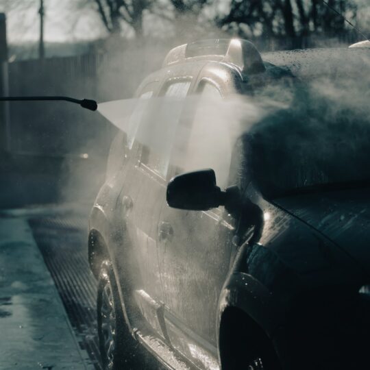 Dirty offroad car in a car wash