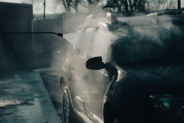 Dirty offroad car in a car wash